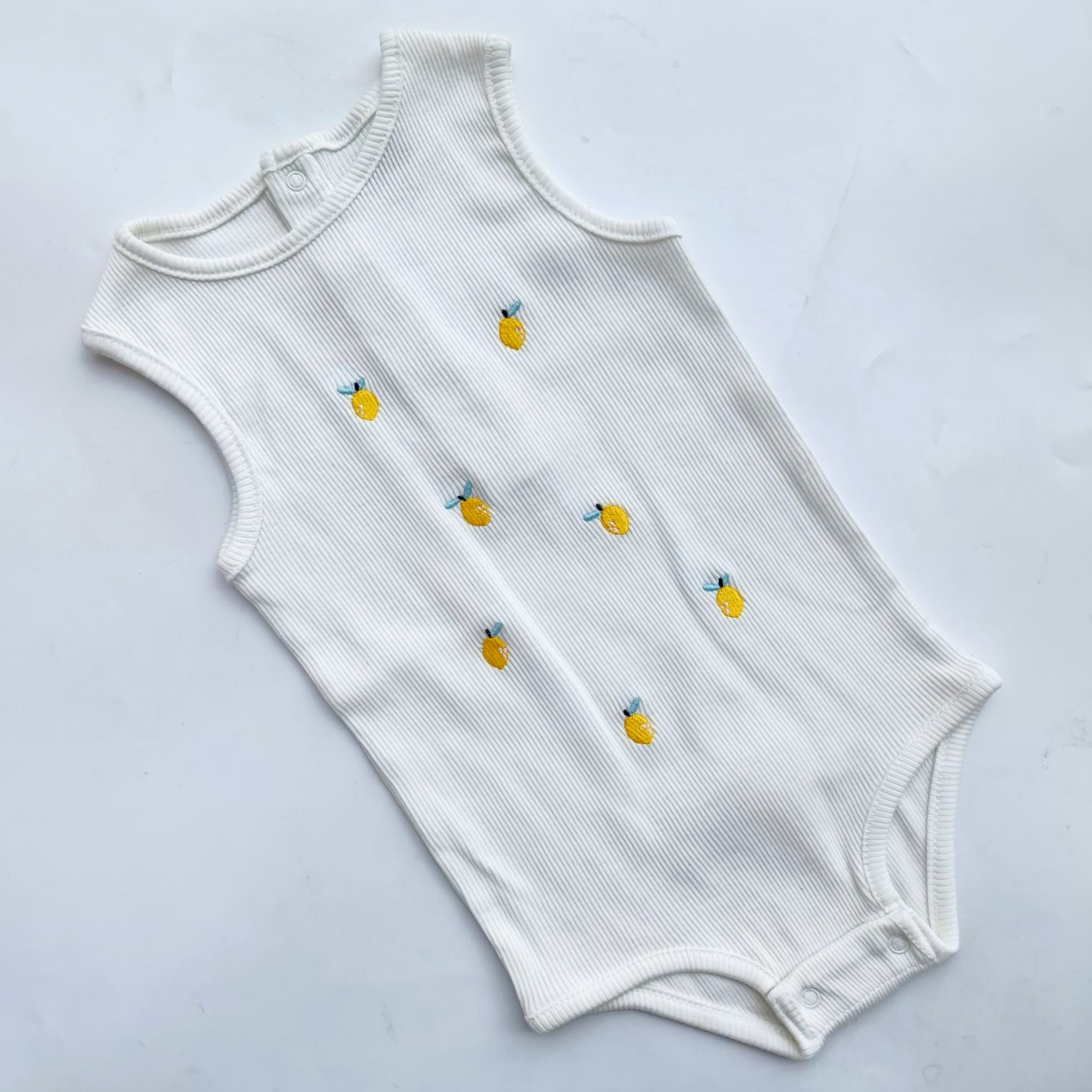 Sleeveless onsies 9-12m