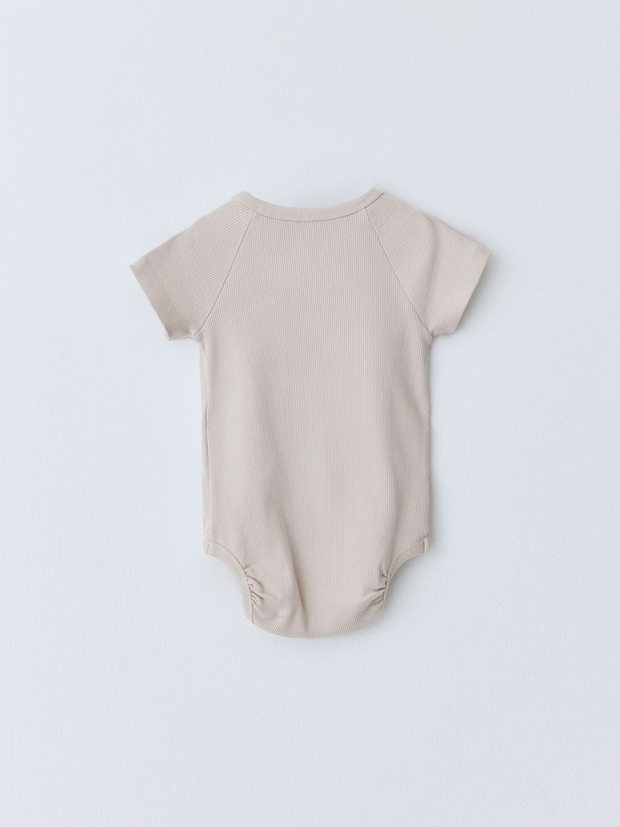 Sela bodysuit